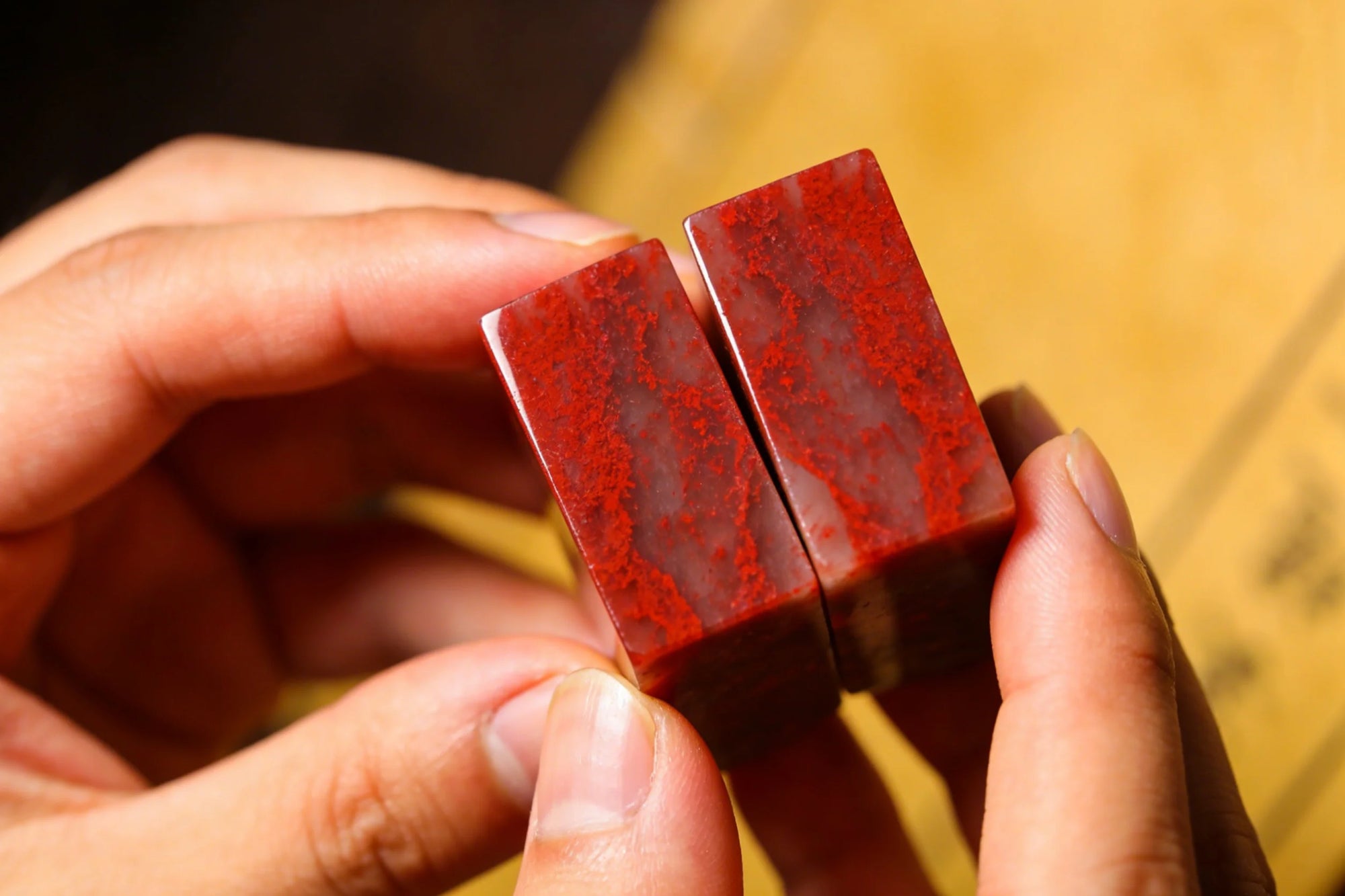 The ToAuto gemstone cutting machine can be used to cut Chicken-Blood_Stone_Seal.