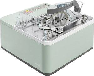 White background product shot of gemstone cutting machine with adjustable clamping fixture and diamond cutting wheel, showing front view of the vise and cooling system interface.